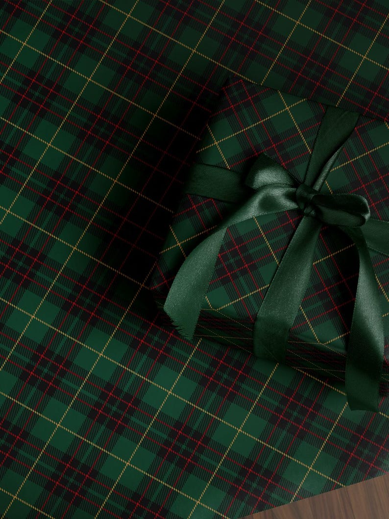 Green Plaid Wrapping Paper Christmas Tartan Gift. Green tartan Christmas wrapping paper with a classic plaid design for a traditional and festive gift wrap.