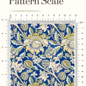 May include: A fabric pattern featuring a repeating floral design with yellow and cream-colored blossoms and green leaves on a deep blue background. The image includes a ruler showing a scale of 5 inches by 5 inches for the pattern repeat.
