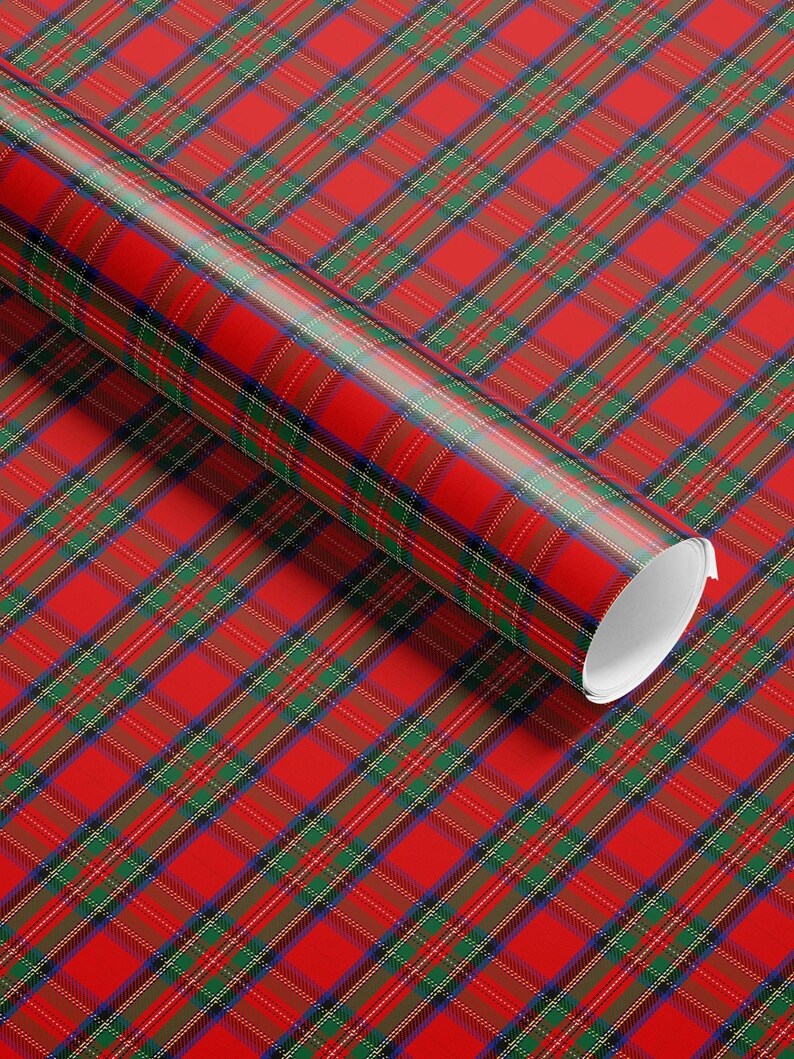 Classic red plaid wrapping paper with vintage tartan and Christmas motifs, perfect for traditional gift wrap.