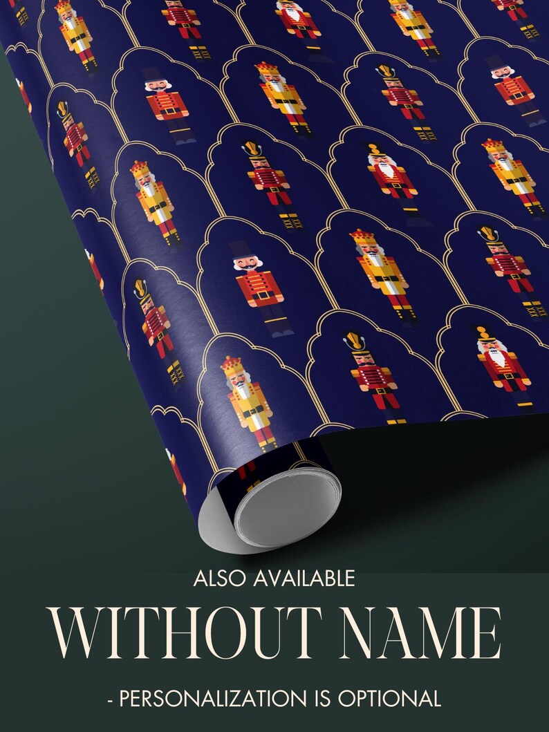 May include: A roll of wrapping paper with a repeating pattern of pixelated nutcracker soldiers in red, yellow, and gold on a dark blue background. The text "ALSO AVAILABLE WITHOUT NAME - PERSONALIZATION IS OPTIONAL" is visible.
