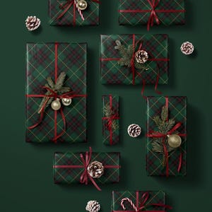 Classic Christmas tartan plaid wrapping paper green
Dark green plaid gift wrap for Christmas presents
Green plaid wrapping paper with a traditional Christmas tartan design, perfect for classy holiday gift wrap.