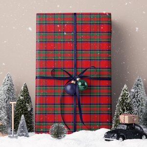 Vintage tartan gift wrap featuring classic red plaid in a royal steward design for holiday presents.
