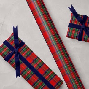 Plaid wrapping paper featuring vintage Christmas plaid and tartan designs, perfect for classic holiday gift wrap.