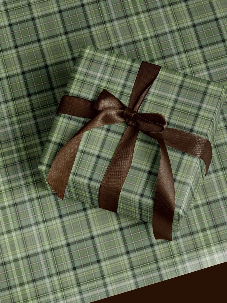 Christmas plaid wrapping paper roll with classic green and red tartan design