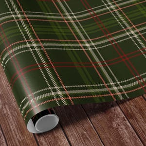 Classic tartan gift wrap featuring green hunter and deer patterns