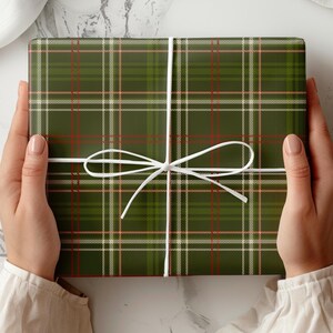Traditional hunter gift wrap with green tartan and plaid design
