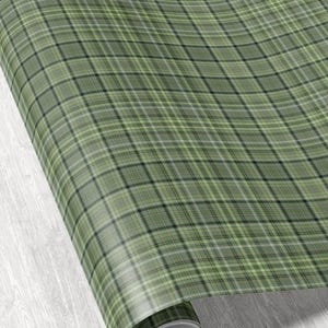 Tartan plaid gift wrap roll perfect for traditional holiday packaging and winter gifts
