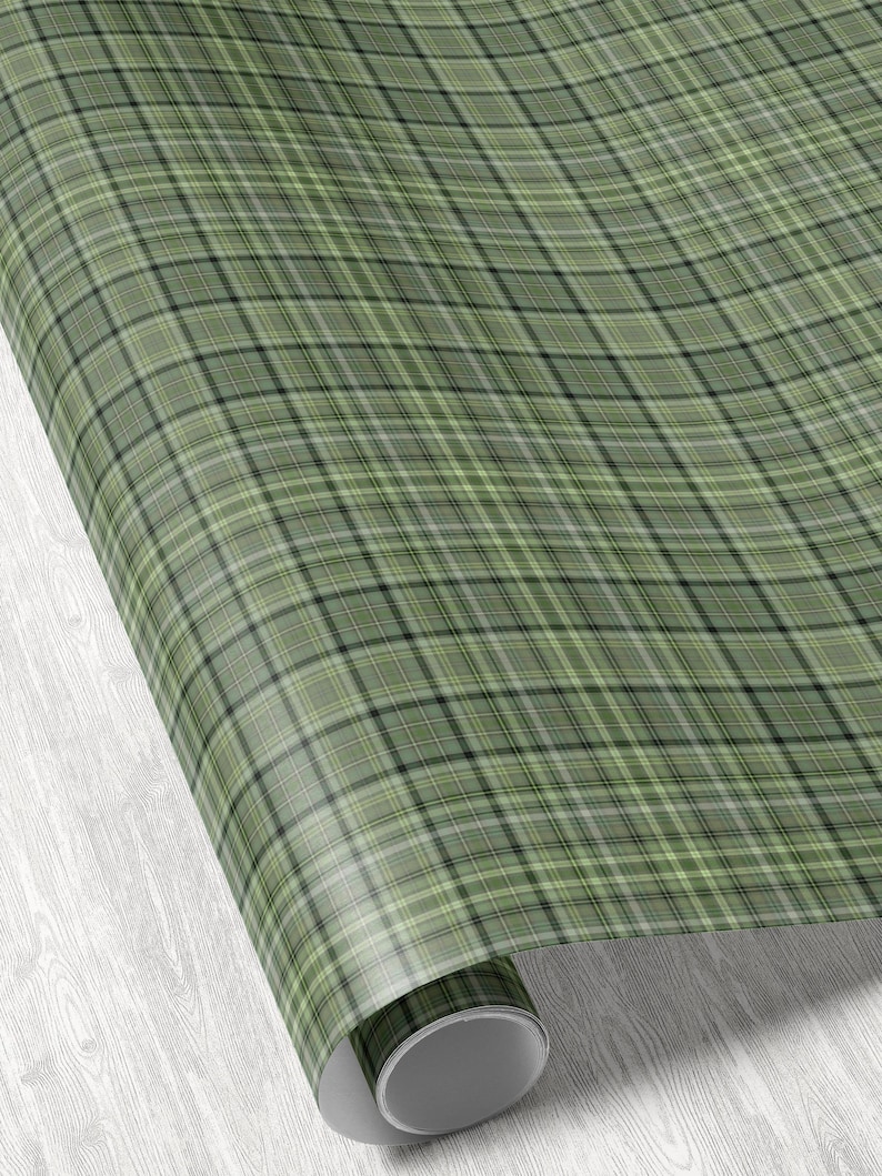 Tartan plaid gift wrap roll perfect for traditional holiday packaging and winter gifts