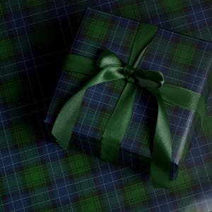 Green navy plaid wrapping paper for holiday gift wrap and Christmas presents