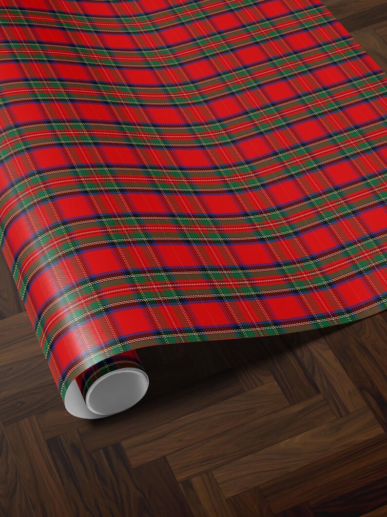 Christmas wrapping paper with plaid and tartan patterns in royal steward red for a timeless look.