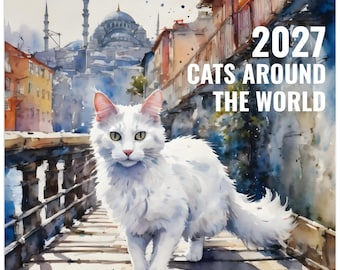 May include: A 2027 wall calendar titled 2027 CATS AROUND THE WORLD featuring a watercolor illustration of a fluffy white cat standing on a wooden bridge with a city skyline and mosque domes in the background with blue and orange tones.