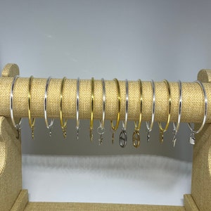 goud en zilverkleurige armband en boeddhistische armband afbeelding 2