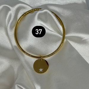 goud en zilverkleurige armband en boeddhistische armband 37