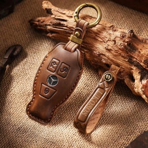 Étui porte-clés en cuir personnalisé compatible pour Mercedes classe C classe E E300L C200L C260L GLA GLB GLC, etc., étui pour clés de voiture, cadeau pour lui et elle