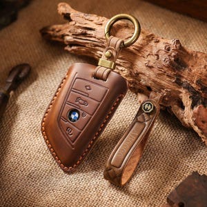 Étui porte-clés en cuir personnalisé compatible pour BMW X1, X3, X5, X7, 3, 5, 6, 7 Series, etc. Étui à clés de voiture pour BMW, Cadeau pour lui et elle