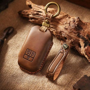 Custodia per chiave auto in pelle personalizzata compatibile con KIA Carnival SX, realizzata a mano, adatta per auto KIA, regalo per lui e per lei.