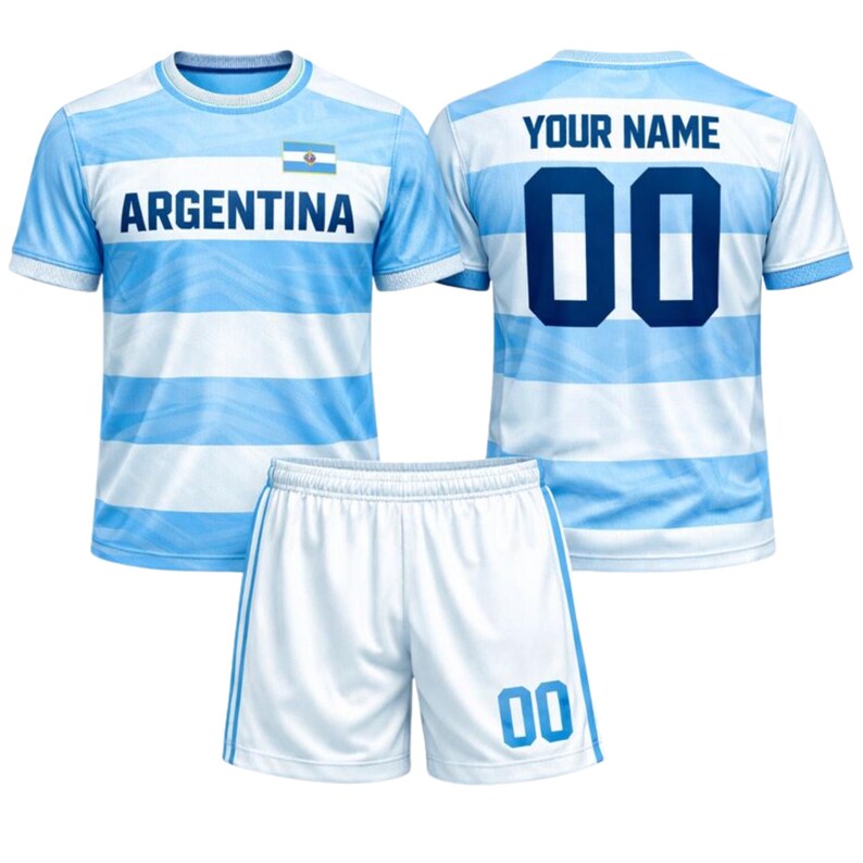 May include: A light blue and white striped football kit. The jersey displays the word "ARGENTINA" and a flag. The back of the jersey has "YOUR NAME" above the number "00". The white shorts have blue stripes and the number "00".