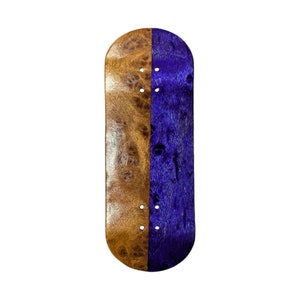 May include: A fingerboard with a brown and purple wood grain design. The fingerboard is made of two different types of wood, one brown and one purple.