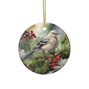May include: A white-throated sparrow perched on a snowy pine branch with red berries. The bird is painted in a watercolor style with a soft, delicate background.