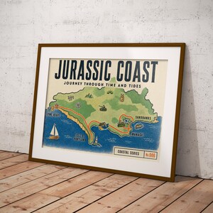 May include: A framed print featuring a map of the Jurassic Coast with the text JURASSIC COAST JOURNEY THROUGH TIME AND TIDES. The map displays green land, blue water, a sailboat, and various icons, with a label reading COASTAL SERIES No. 006.