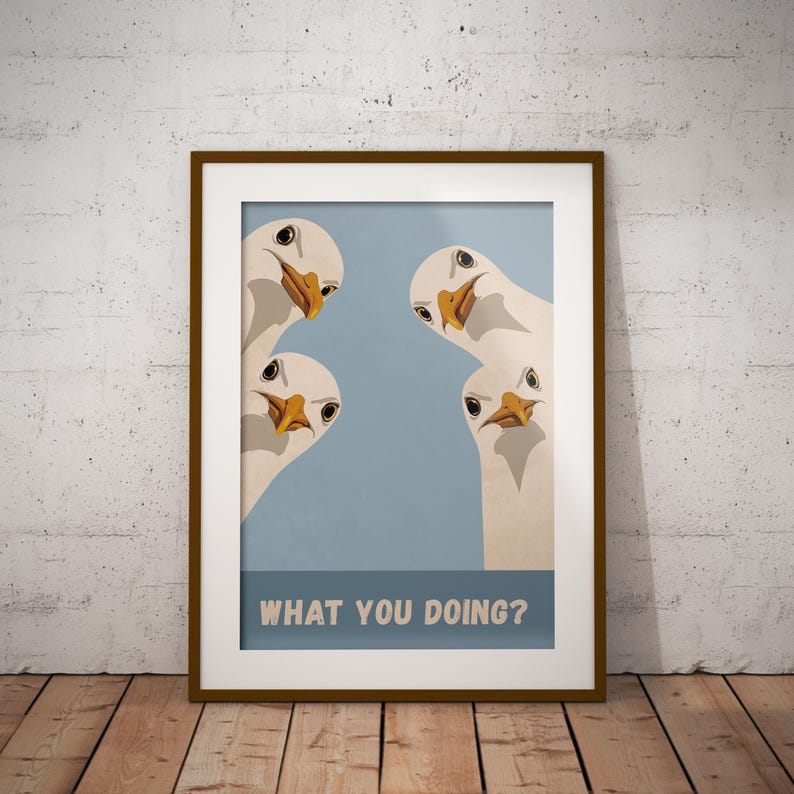 Retro illustrated print of four quirky seagulls peeking into the frame with the text ‘What You Doing?’ on a coastal-style background