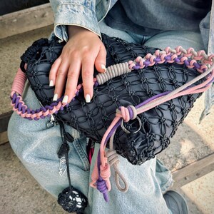 Comfort, creativity, and craftsmanship in one. This macrame crossbody bag with charm options is ready for your next story. Gorpcore bag | charm.