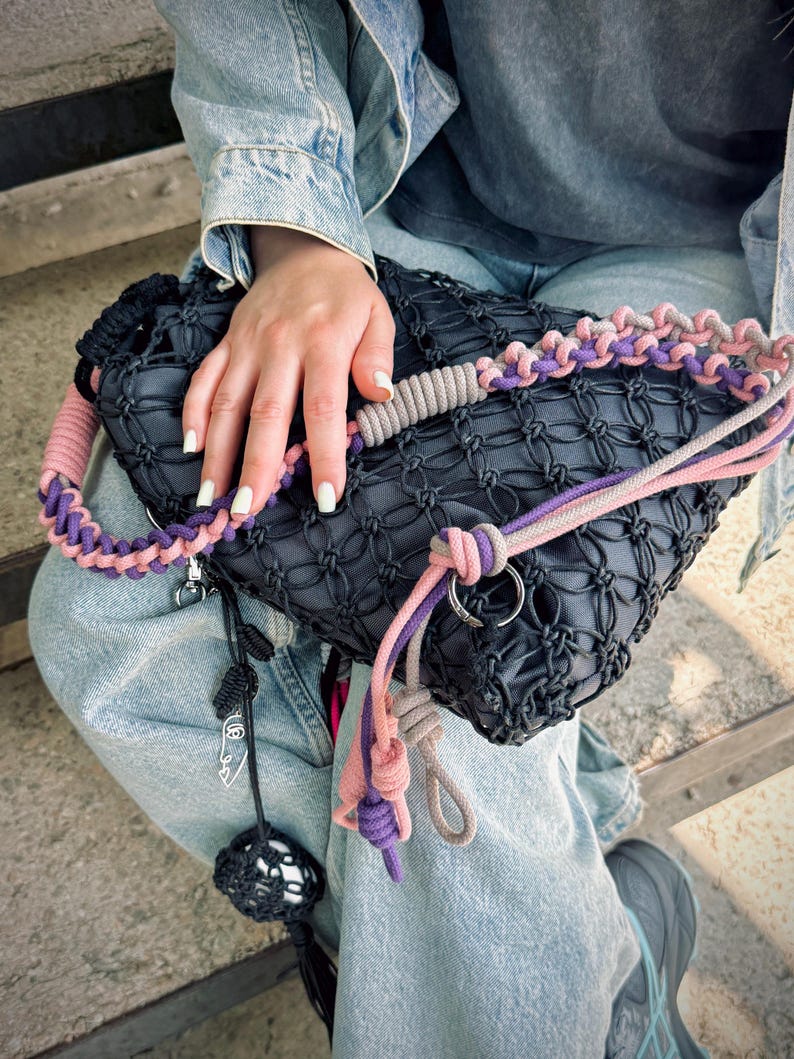Comfort, creativity, and craftsmanship in one. This macrame crossbody bag with charm options is ready for your next story. Gorpcore bag | charm.