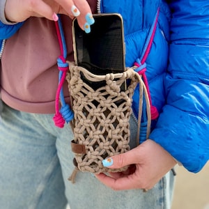 Close-up of natural macrame texture – fits most smartphones.