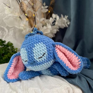 May include: A set of three ceramic mugs with a speckled, matte finish in cream, light grey, and dark grey. Each mug has a simple, minimalist design, ideal for coffee or tea.