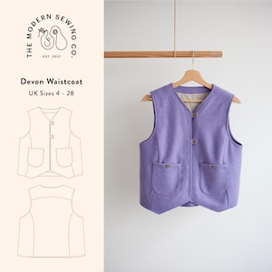 May include: A purple waistcoat with two pockets and a button closure. The waistcoat is hanging on a wooden hanger. The text "Devon Waistcoat" and "UK Sizes 4 - 28" is printed below the image.