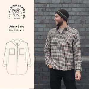 May include: A black and white checked shirt with a button-up front and long sleeves. The shirt is being modelled by a person wearing a black beanie with a green stripe. The text "The Modern Sewing Co. Est. 2021" and "Unisex Shirt Sizes XS2 - XL3" is printed on a white background.