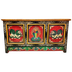 Hand-Carved Tibetan Snow Lion Cabinet: Ornate Buddhist Furniture