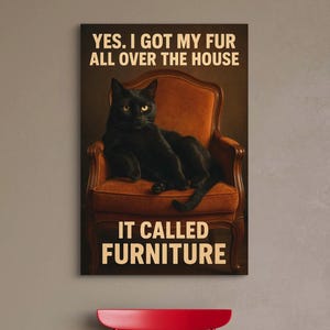 May include: A framed canvas print featuring a black cat lounging on a vintage orange armchair. The print has text that reads "YES, I GOT MY FUR ALL OVER THE HOUSE. IT CALLED FURNITURE."