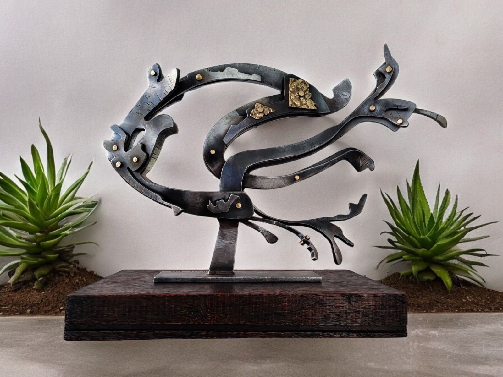 Steel Fish nautilus. Abstract Sculpture is a Decoration That Will Bring ...