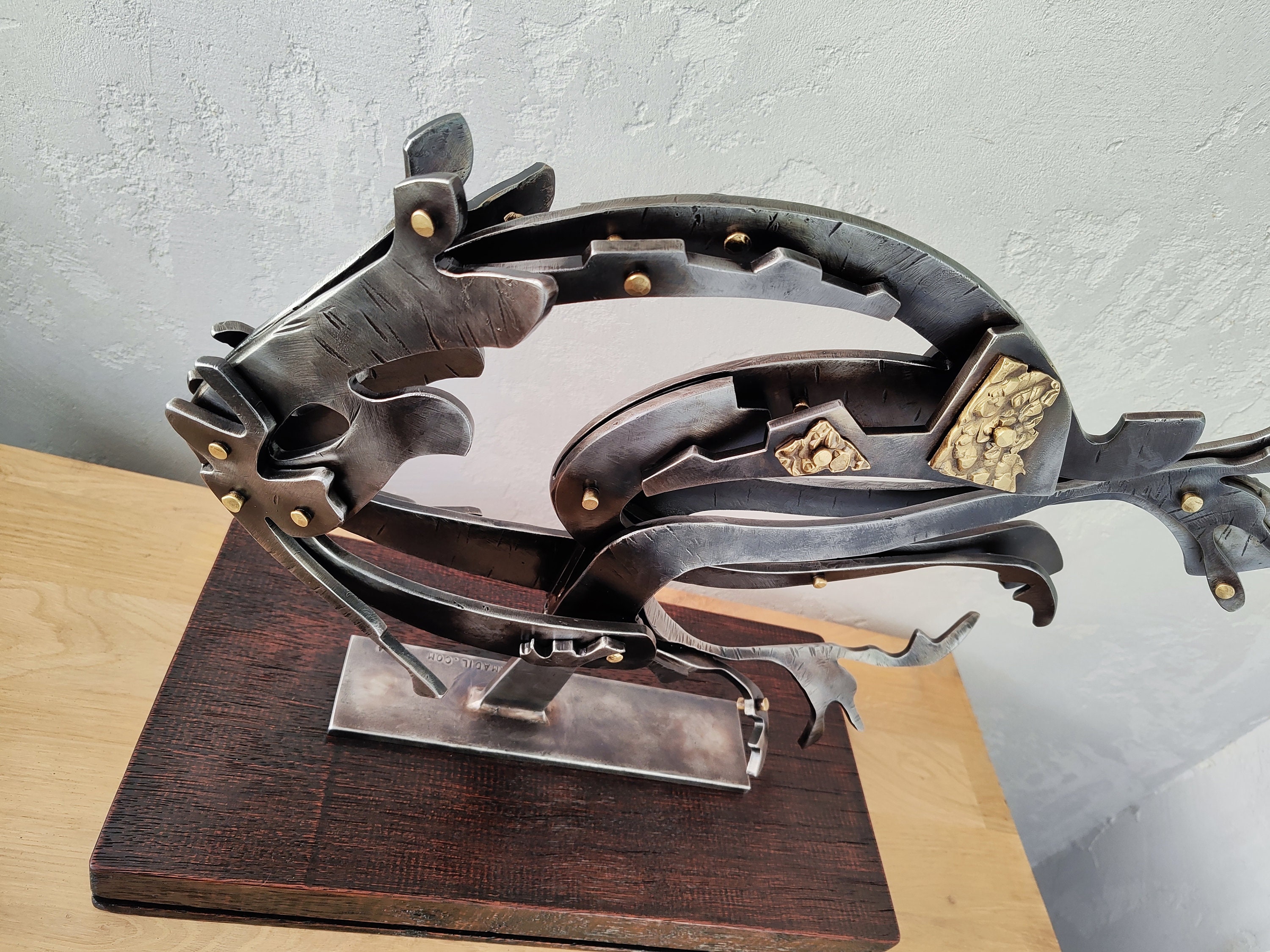 Steel Fish nautilus. Abstract Sculpture is a Decoration That Will Bring ...