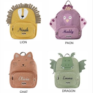 May include: Four children's backpacks in various animal designs. The backpacks include a lion, a peacock, a cat, and a dragon. Each backpack has a front pocket with a name and the brand name "trixie". The lion backpack is yellow, the peacock is purple, the cat is orange, and the dragon is green.