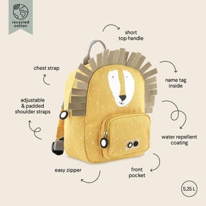 May include: Yellow lion-themed backpack made from recycled cotton. Features a front pocket, easy zipper, adjustable shoulder straps, and a chest strap. Includes a short top handle and a water-repellent coating. The backpack has a 5.25 L capacity.