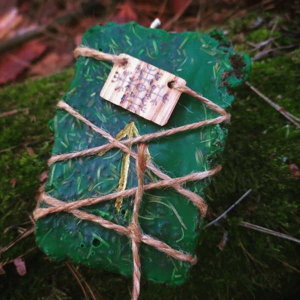 Runic candle cast from forest soil!