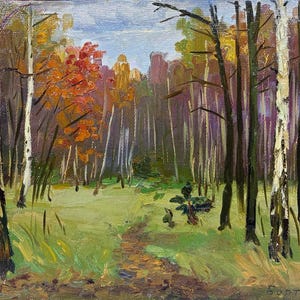 May include: An oil painting on canvas depicting a forest scene with white-barked birch trees, green grass, and autumn foliage in shades of orange and yellow. A dirt path leads into the woods, and the artist's signature and date 1963 appear in the corner.
