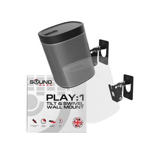 May include: A black Soundbass Play:1 tilt and swivel wall mount for a speaker. The packaging box features the text Soundbass Play:1 Tilt & Swivel Wall Mount, along with icons for mounting hardware, 10-minute installation, and a 2-year warranty.