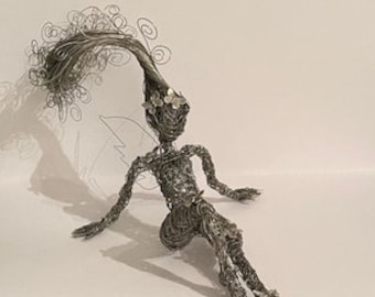 Wire art fairy sculpture with butterfly's