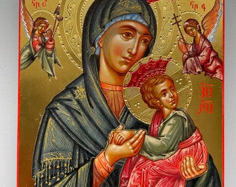 Könnte beinhalten: Eine religiöse Ikone, die die Jungfrau Maria zeigt, die das Jesuskind hält. Die Ikone ist in traditionellem Stil mit Goldblatt-Akzenten gemalt und trägt eine rote und goldene Krone auf Marias Kopf. Die Ikone ist in einem roten Holzrahmen gerahmt.