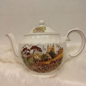 Beautiful vintage Windsor swirl teapot with country scene.