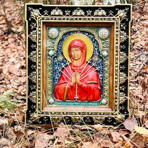 Icon of the Virgin Mary "Seven-Arrow Icon" in Wooden Frame. Carved Christian Art Wall Painting. Engraved Icon Christmas Decoration.