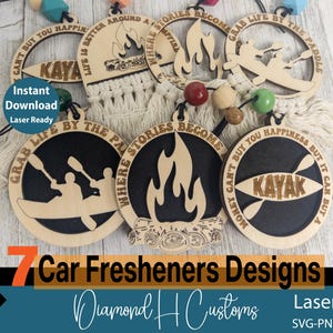 May include: Seven laser cut wood car freshener designs with various sayings and images. The designs include a campfire, a kayak, and a canoe. The text on the designs includes "Where stories become campfire", "Grab life by the paddle", "Money can't buy you happiness but it can buy a kayak", and "Life is better around a campfire".