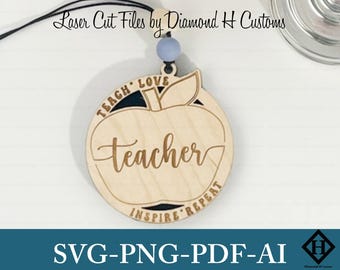 May include: A wooden apple-shaped teacher appreciation ornament. The word "teacher" is in cursive, with "Teach Love Inspire Repeat" around the apple's edge. The ornament is attached to a black string with a blue bead. Text at the bottom reads "SVG-PNG-PDF-AI".
