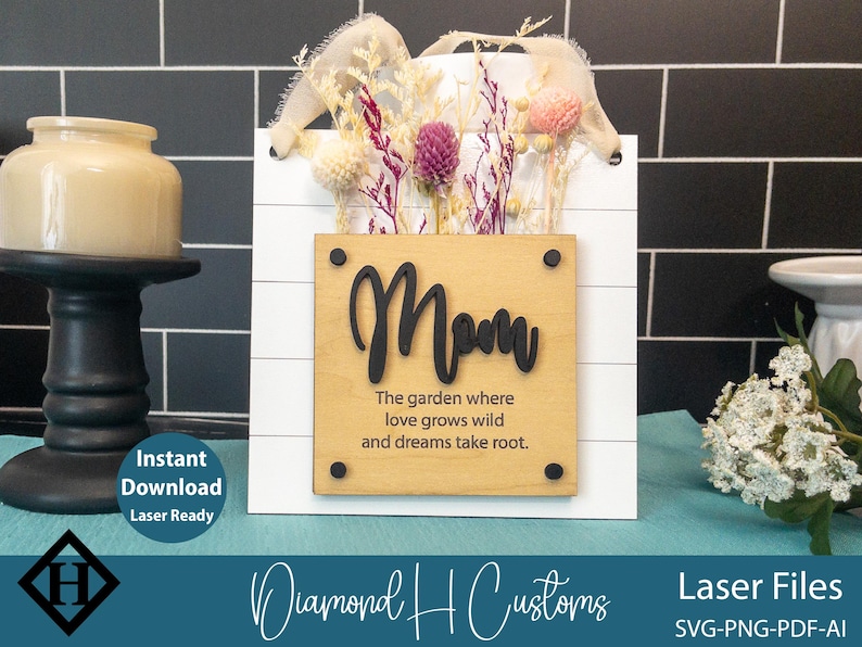 Laser cut Mother's Day gift flower holder sign with dried flowers and "Mom" quote, available as SVG cut file for laser crafting