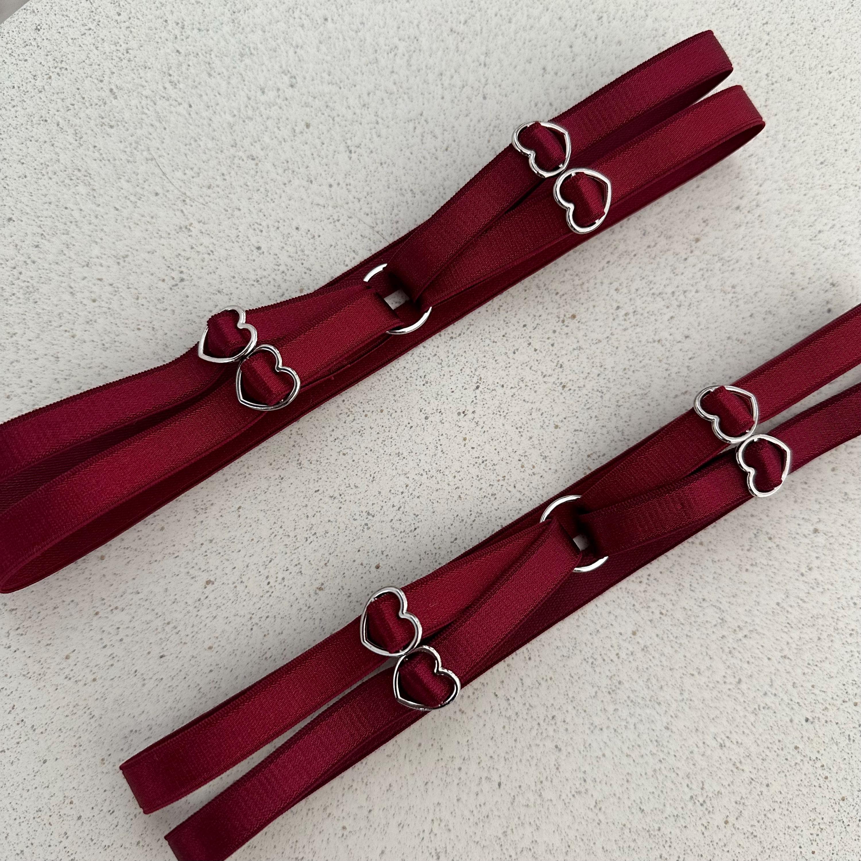 set of 2 adjustable burgundy thigh garters with silver color heart details