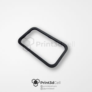 Op de afbeelding: Zwart plastic frame, rechthoekig met afgeronde hoeken. Het frame is ontworpen om een telefoon of ander apparaat te houden.