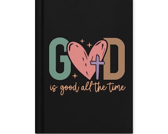 May include: Black journal with the words "GOD" in teal, pink, and brown, with a cross and heart design. The phrase "is good all the time" is written in cursive below the main text.
